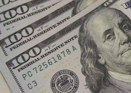 D&oacute;lar cai 0,24% e fecha a R$ 5,13 com juros no radar do mercado