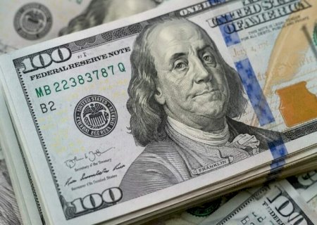 D&oacute;lar sobe a R$ 5,15 na v&eacute;spera de decis&otilde;es de juros no Brasil e EUA